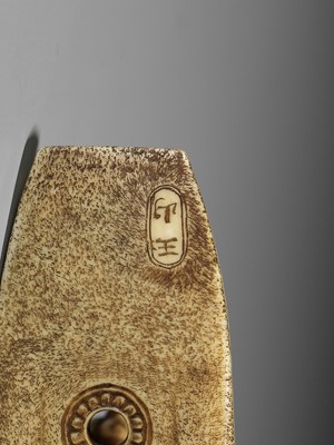 Lot 382 - GYOKUZAN: AN IVORY NETSUKE OF TWO SAMURAI FIGHTING IN A HUGE ABUMI (STIRRUP)