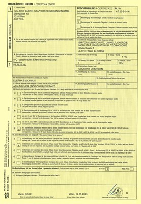 Lot 382 - GYOKUZAN: AN IVORY NETSUKE OF TWO SAMURAI FIGHTING IN A HUGE ABUMI (STIRRUP)