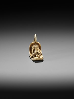 Lot 382 - GYOKUZAN: AN IVORY NETSUKE OF TWO SAMURAI FIGHTING IN A HUGE ABUMI (STIRRUP)