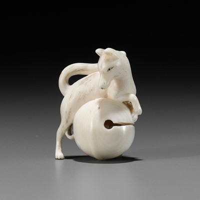Lot 356 - RANTEI: A FINE IVORY NETSUKE OF A FOX WITH TEMPLE BELL