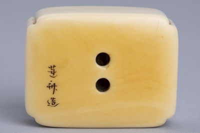 Lot 376 - RENSAI: AN INLAID IVORY MANJU-STYLE NETSUKE DEPICTING A BOY, 19th CENTURY