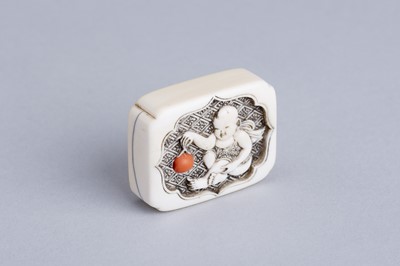 Lot 376 - RENSAI: AN INLAID IVORY MANJU-STYLE NETSUKE DEPICTING A BOY, 19th CENTURY