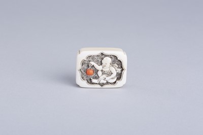 Lot 376 - RENSAI: AN INLAID IVORY MANJU-STYLE NETSUKE DEPICTING A BOY, 19th CENTURY