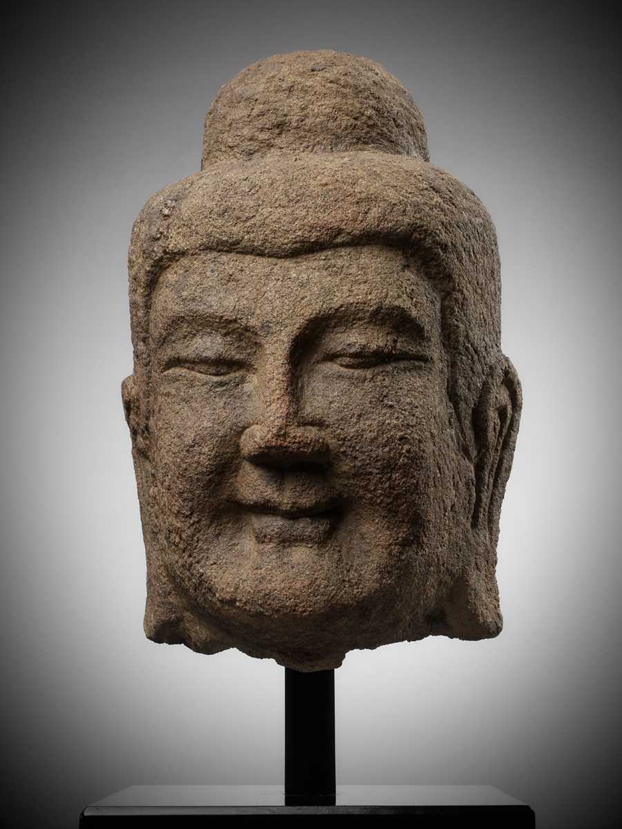 Lot 182 - A MONUMENTAL SANDSTONE HEAD OF BUDDHA,