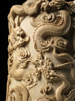 Lot 271 - A SUPERB AND LARGE IVORY TUSK BOX AND COVER DEPICTING A TIGER AND DRAGONS