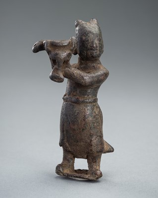 Lot 715 - A BRONZE 'BOY' JOSS STICK HOLDER, MING DYNASTY