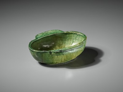 Lot 438 - A GREEN-GLAZED POTTERY EAR CUP, HAN DYNASTY