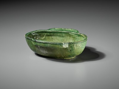 Lot 438 - A GREEN-GLAZED POTTERY EAR CUP, HAN DYNASTY