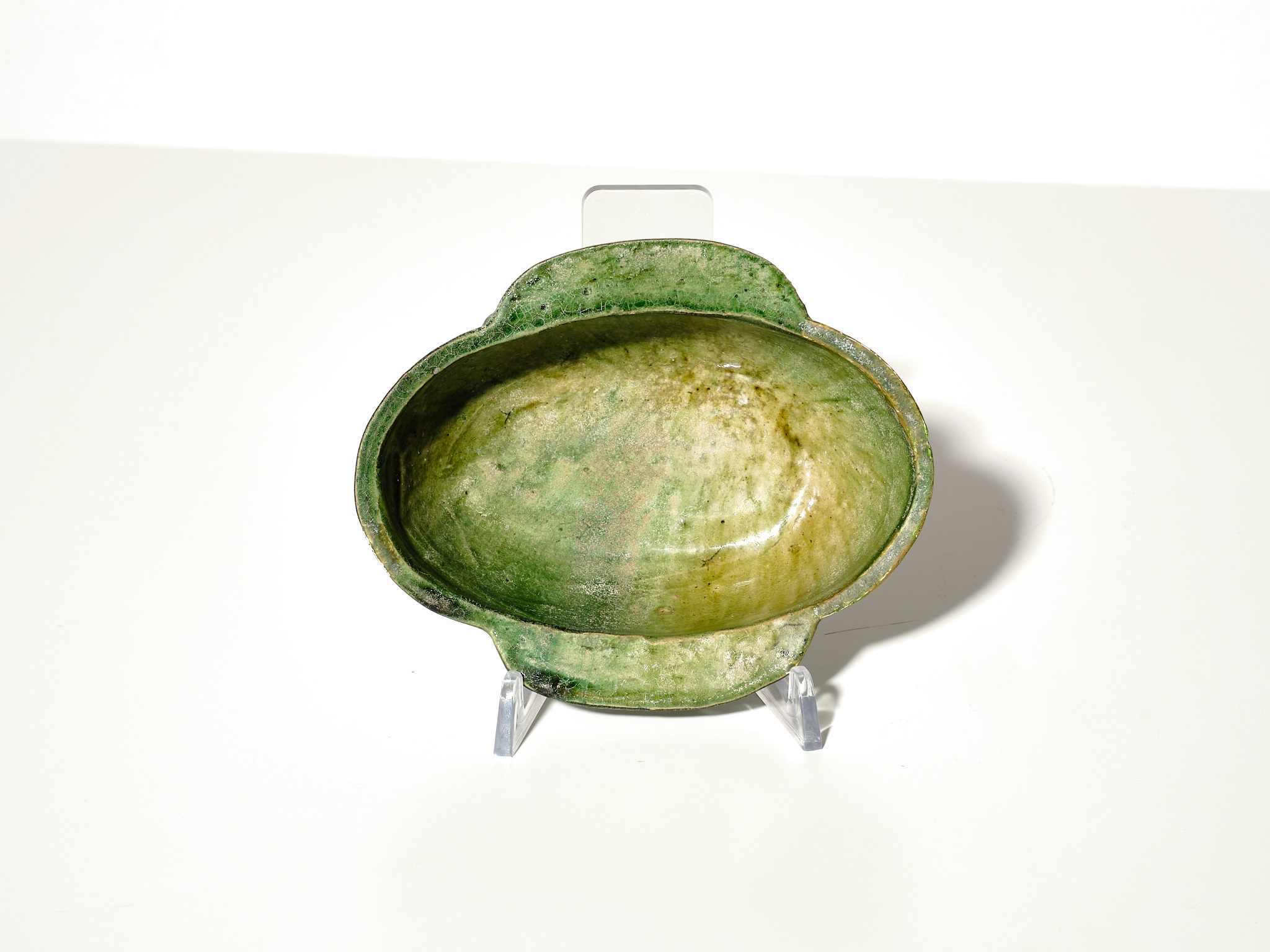 Lot 438 - A GREEN-GLAZED POTTERY EAR CUP, HAN DYNASTY