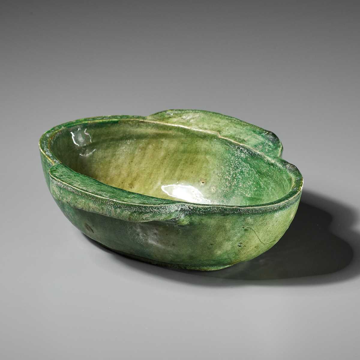 Lot 438 - A GREEN-GLAZED POTTERY EAR CUP, HAN DYNASTY