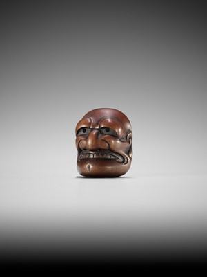 Lot 835 - TADATOSHI: A FINE NAGOYA SCHOOL WOOD MASK NETSUKE OF BUAKU