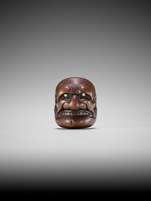 Lot 835 - TADATOSHI: A FINE NAGOYA SCHOOL WOOD MASK NETSUKE OF BUAKU