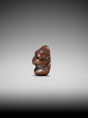 Lot 835 - TADATOSHI: A FINE NAGOYA SCHOOL WOOD MASK NETSUKE OF BUAKU