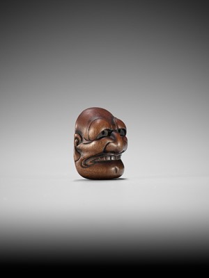 Lot 835 - TADATOSHI: A FINE NAGOYA SCHOOL WOOD MASK NETSUKE OF BUAKU