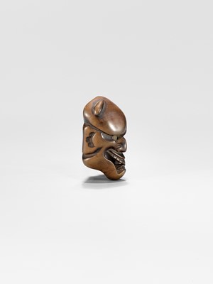 Lot 430 - DEME UMAN: A WOOD MASK NETSUKE OF KIJO