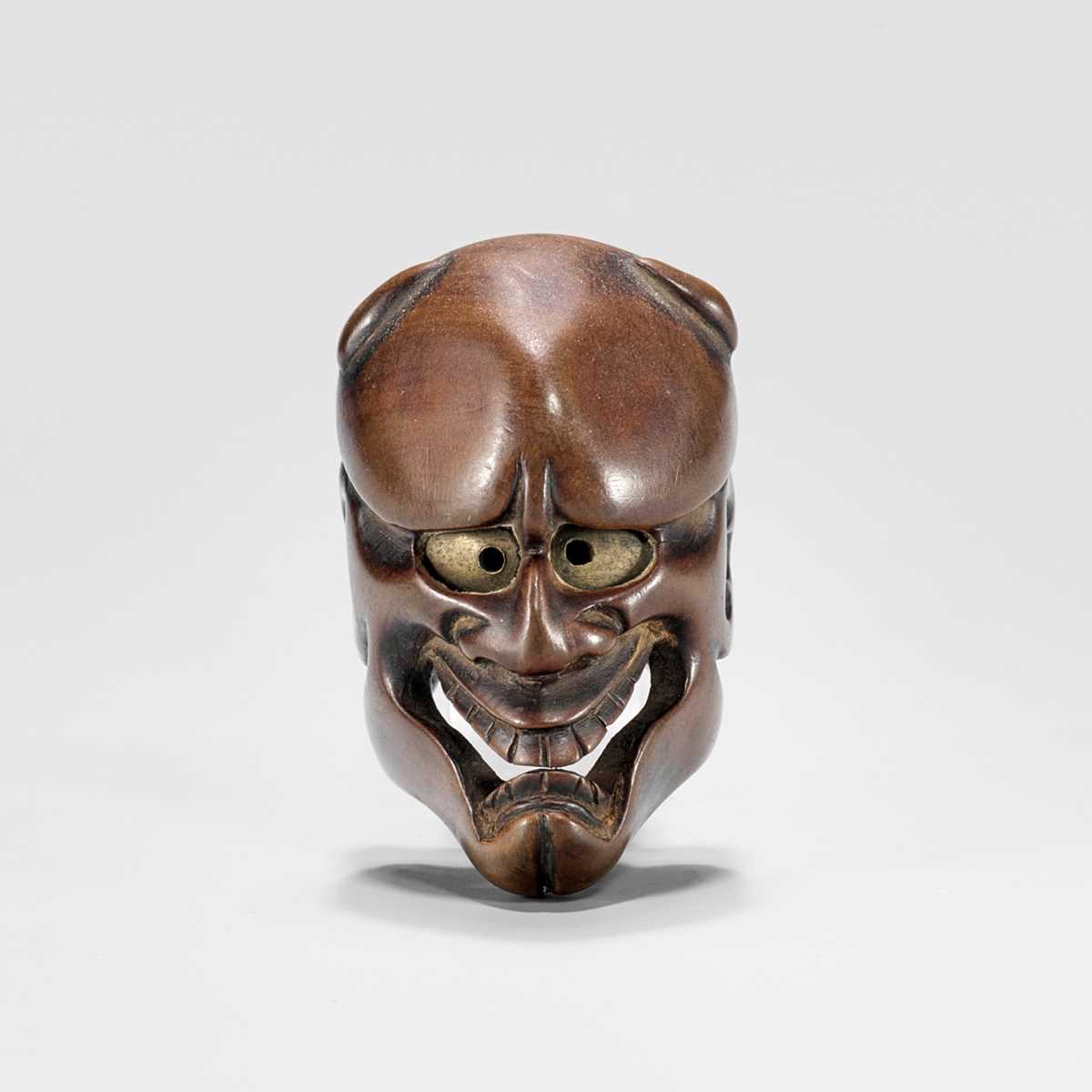 Lot 430 - DEME UMAN: A WOOD MASK NETSUKE OF KIJO