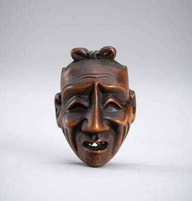 Lot 851 - DEME UMAN: A WOOD NOH MASK NETSUKE OF SHIWAJO, EDO