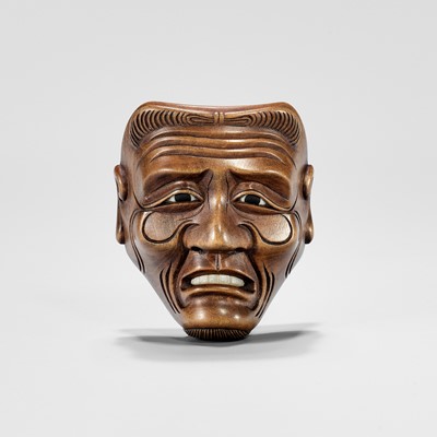 Lot 840 - A FINE INLAID WOOD NOH MASK NETSUKE OF TOKUSA-JO