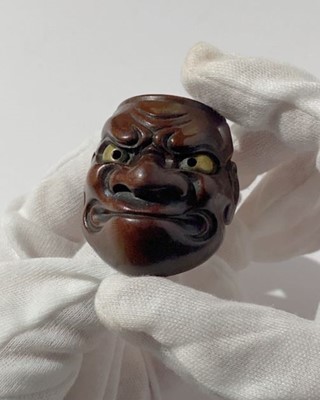 Lot 834 - DEME UMAN: A WOOD NOH MASK NETSUKE OF O-BESHIMI
