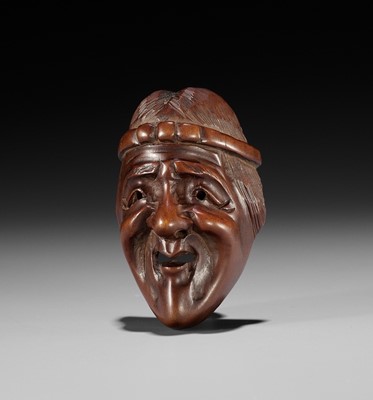 Lot 852 - DEME: A WOOD MASK NETSUKE OF UBA, EDO PERIOD