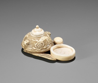 Lot 636 - KIYOKATSU: AN IVORY NETSUKE WITH UTENSILS (CHADOGU) FOR THE TEA CEREMONY (CHANOYU)