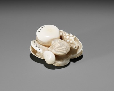 Lot 885 - HOSHINSAI: AN IVORY NETSUKE OF A GROUP OF CLAMS