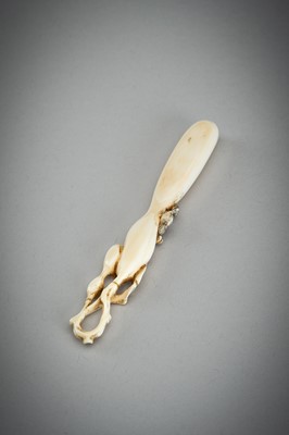 Lot 731 - A LARGE IVORY SASHI NETSUKE OF A DORMOUSE ON A GOURD, MEIJI