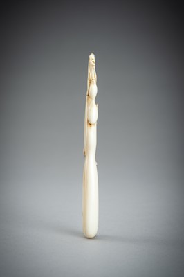 Lot 731 - A LARGE IVORY SASHI NETSUKE OF A DORMOUSE ON A GOURD, MEIJI