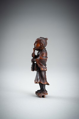 Lot 861 - A WOOD NETSUKE OF A KOMUSO MONK, MEIJI PERIOD