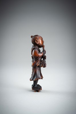 Lot 861 - A WOOD NETSUKE OF A KOMUSO MONK, MEIJI PERIOD