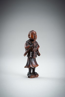 Lot 861 - A WOOD NETSUKE OF A KOMUSO MONK, MEIJI PERIOD