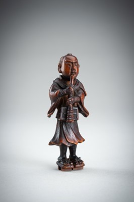 Lot 861 - A WOOD NETSUKE OF A KOMUSO MONK, MEIJI PERIOD