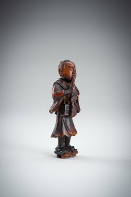 Lot 861 - A WOOD NETSUKE OF A KOMUSO MONK, MEIJI PERIOD