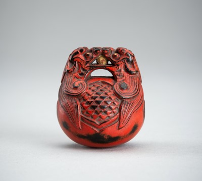 Lot 783 - A SIGNED NEGORO LACQUER NETSUKE OF A MOKUGYO, EDO PERIOD