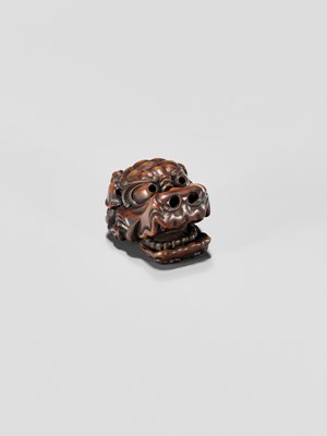 Lot 433 - A WOOD NETSUKE OF A SHISHI MASK WITH MOVABLE JAW