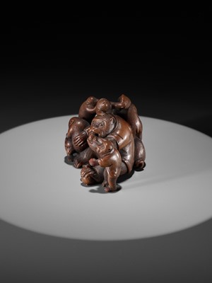 Lot 261 - UNHODO MASAYOSHI: A SUPERB WOOD OKIMONO OF A GROUP OF MONKEYS AND DOG