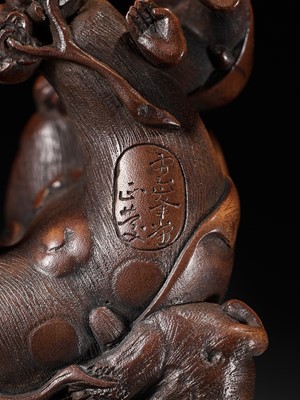 Lot 261 - UNHODO MASAYOSHI: A SUPERB WOOD OKIMONO OF A GROUP OF MONKEYS AND DOG