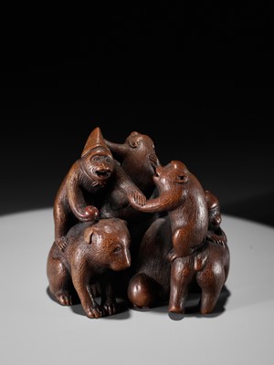 Lot 261 - UNHODO MASAYOSHI: A SUPERB WOOD OKIMONO OF A GROUP OF MONKEYS AND DOG