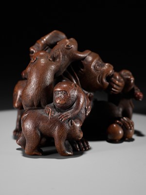 Lot 261 - UNHODO MASAYOSHI: A SUPERB WOOD OKIMONO OF A GROUP OF MONKEYS AND DOG