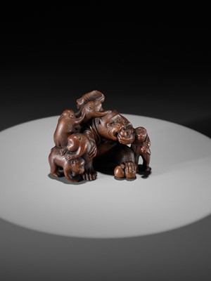 Lot 261 - UNHODO MASAYOSHI: A SUPERB WOOD OKIMONO OF A GROUP OF MONKEYS AND DOG