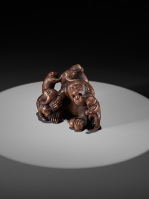 Lot 261 - UNHODO MASAYOSHI: A SUPERB WOOD OKIMONO OF A GROUP OF MONKEYS AND DOG