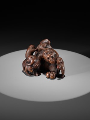 Lot 261 - UNHODO MASAYOSHI: A SUPERB WOOD OKIMONO OF A GROUP OF MONKEYS AND DOG