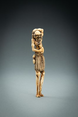 Lot 391 - A TALL IVORY NETSUKE OF ASHINAGA WITH A CANDLE