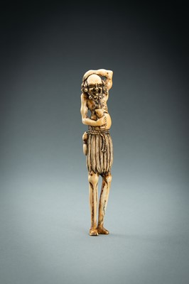 Lot 391 - A TALL IVORY NETSUKE OF ASHINAGA WITH A CANDLE