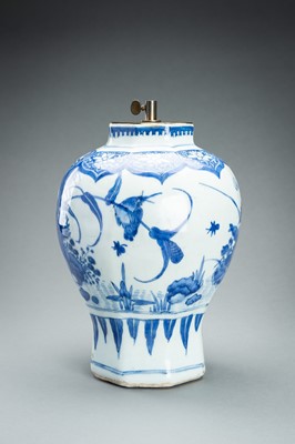 Lot 388 - A BLUE AND WHITE PORCELAIN ‘BIRDS AND FLOWERS’ VASE, QING