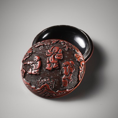 Lot 292 - A CINNABAR LACQUER ‘PLAYING BOYS’ SEAL PASTE BOX AND COVER, MING DYNASTY