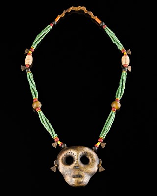 Lot 227 - A BRONZE NAGA HEADHUNTER’S TROPHY HEAD NECKLACE