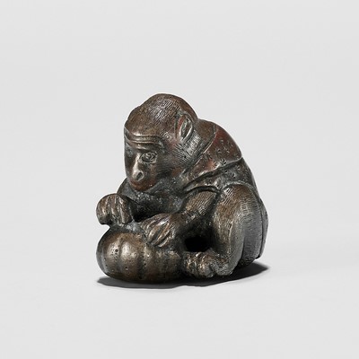 Lot 401 - A RARE BRONZE NETSUKE OF A MONKEY WITH GOURD