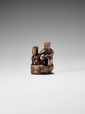 Lot 402 - HOMIN: A GOOD WOOD NETSUKE OF RAIJIN WITH BATHING WOMAN