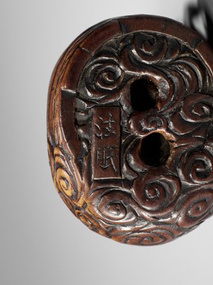 Lot 402 - HOMIN: A GOOD WOOD NETSUKE OF RAIJIN WITH BATHING WOMAN
